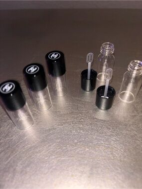 CHANEL Mini Clear Lip Gloss Vials with Black Logo Caps